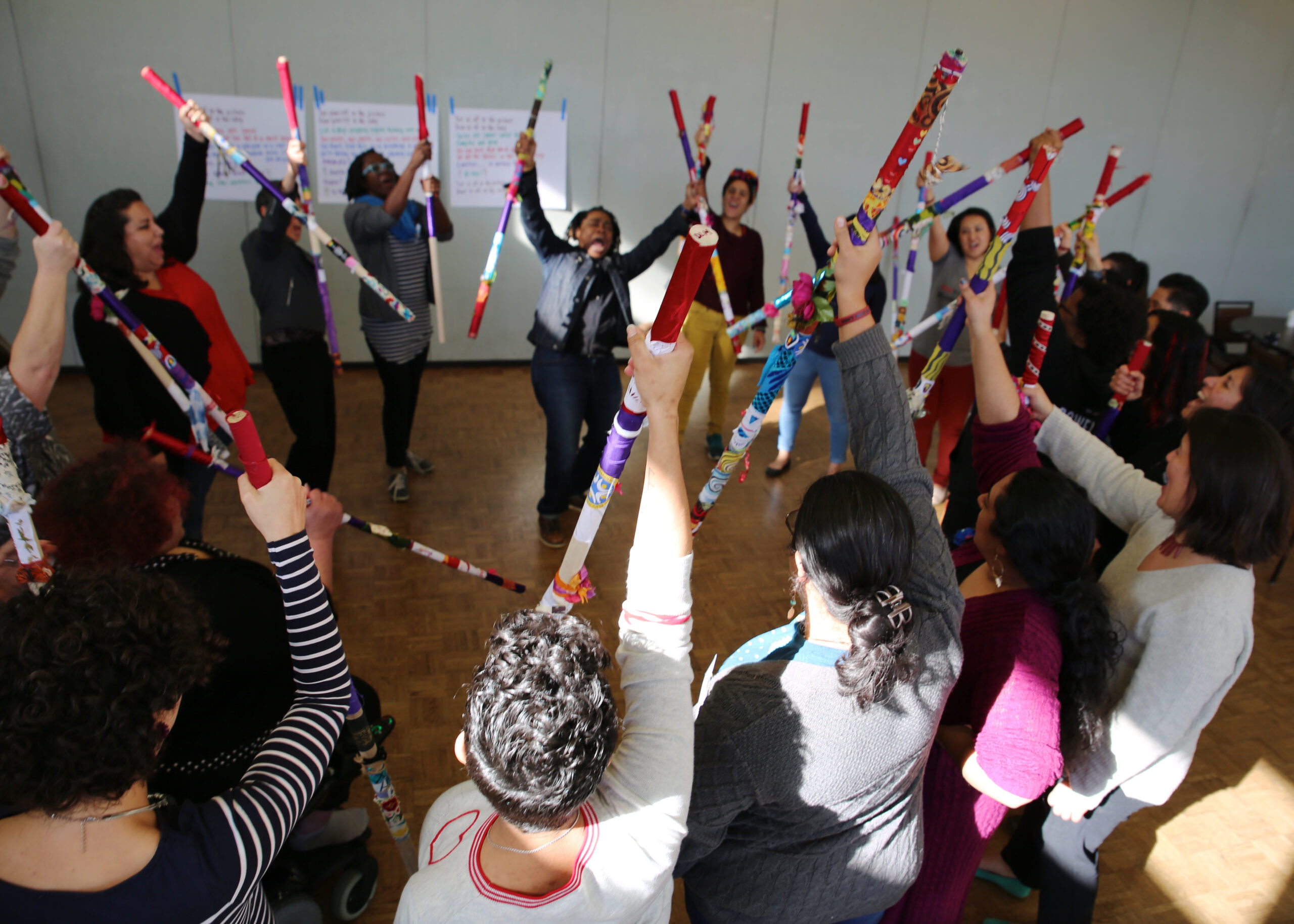 Group of people participating in an immersive workshop.